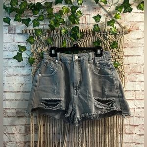 grey ripped jean shorts